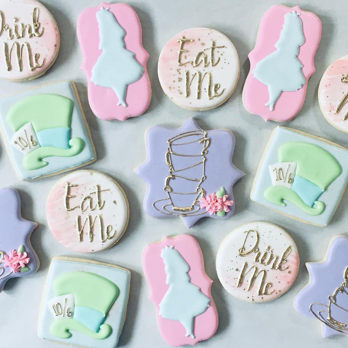 Have I Gone Mad? I'm Afraid So You're Entirely Bonkers But I Will Tell You Secret All The Best People Are Alice In Wonderland Mad Hatter Iced Sugar Cookies TheIcedSugarCookie.com Created by @nicolle_deacon #cookies #sugarcookies #icedsugarcookies #alicein
