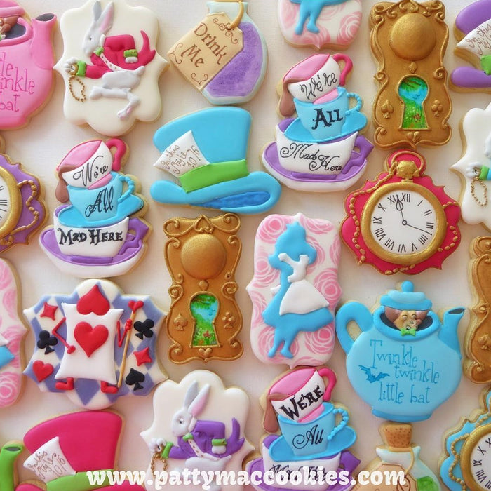 Alice In ONE-derland Iced Sugar Cookies featured on TheIcedSugarCookie.com created by @pattymaccookies #cookies #aliceinwonderlandcookies #aliceinwonderland #aliceinwonderlandsugarcookies #sugarcookies #partyideas #baking