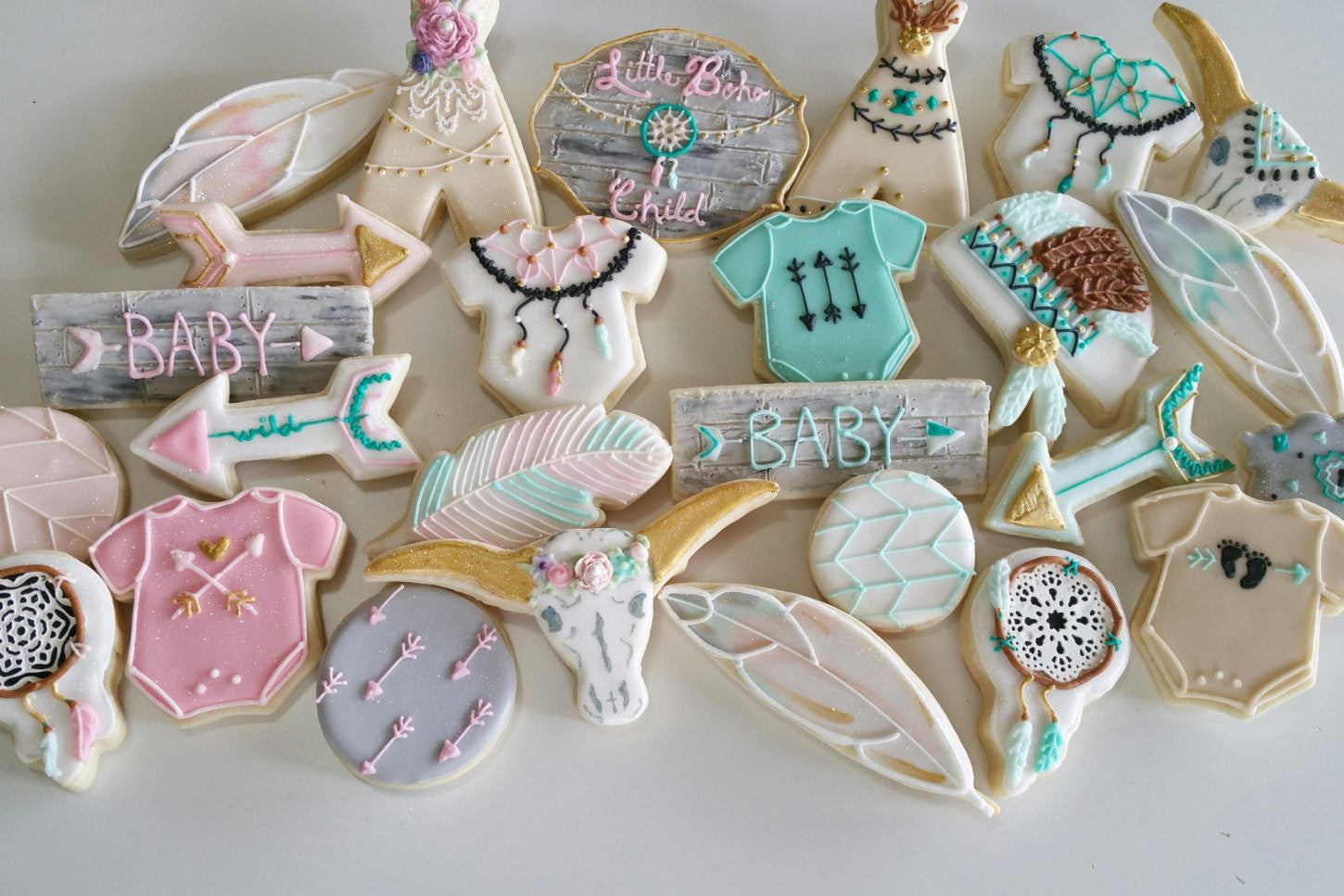 Little Boho Child Baby Shower Cookies TheIcedSugarCookie.com Kessa Cakes Bohemian Cookies Birthday Party Ideas