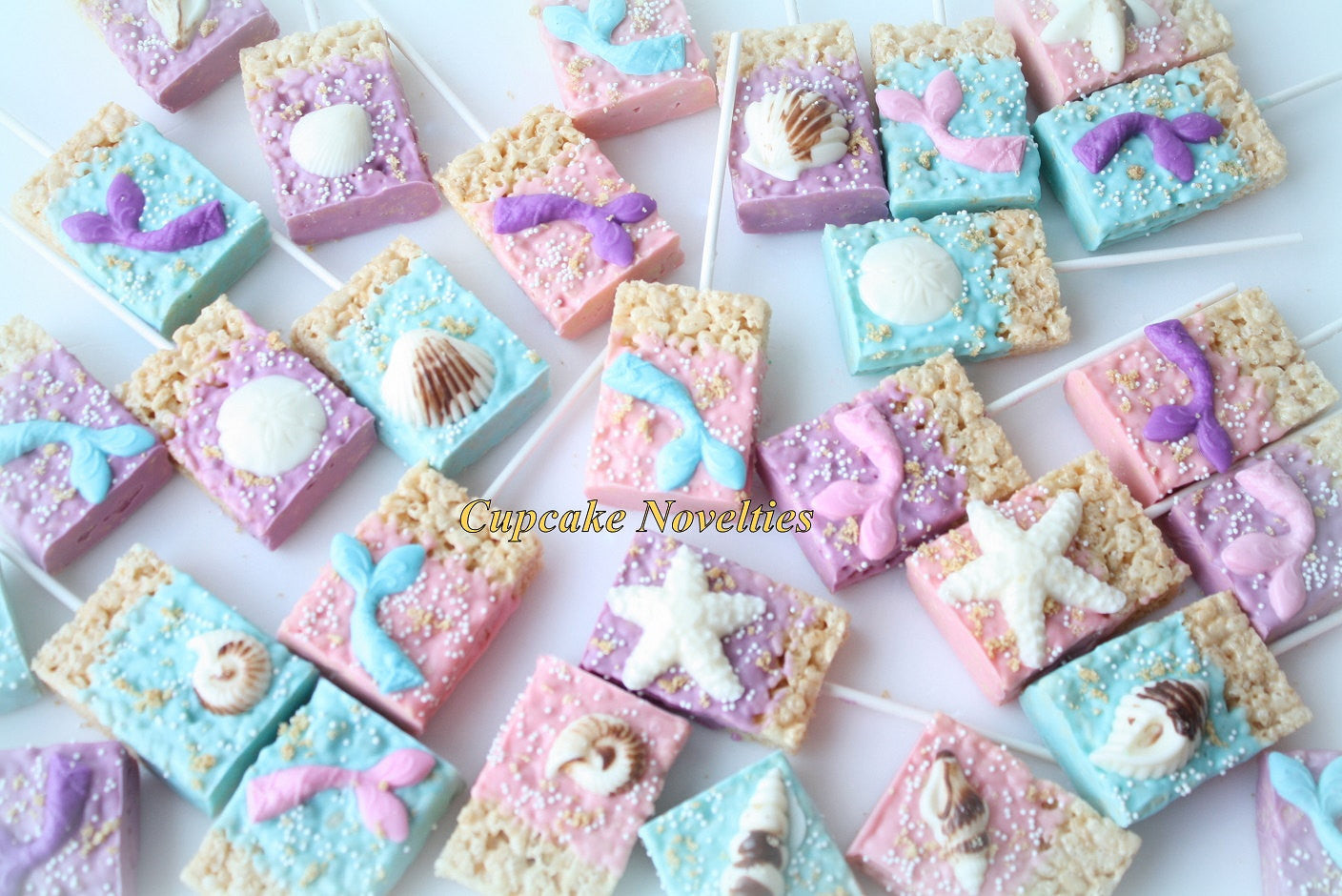 Mermaids Tails And Seashells Chocolate Dipped Rice Krispy Treats- Mermaid Under The Sea Birthday Party. TheIcedSugarCookie.com Cupcake Novelties