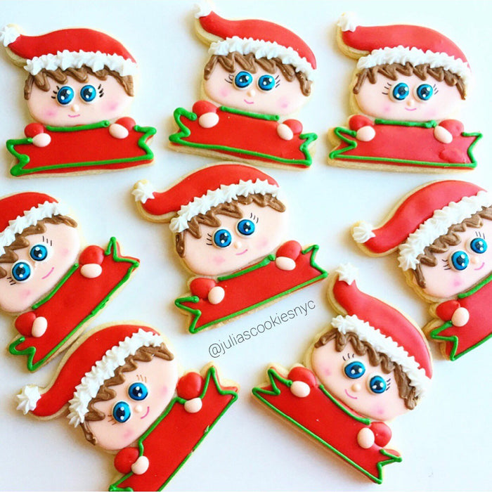 Christmas Elf Iced Sugar Cookies by Julia Perugini from "Cookies By Julia" featured on TheIcedSugarCookie.com #elfcookies #elfsugarcookies #elf #sugarcookies #decoratedsugarcookies #christmascookies #christmas #theicedsugarcookie