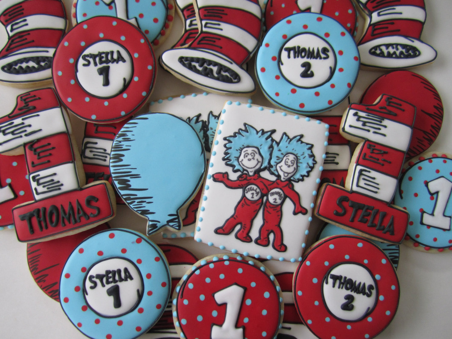 Dr. Seuss Cat In The Hat 1st Birthday Party Sugar Cookies-Thing One And Thing Two TheIcedSugarCookie.com Finger Hut Cakes