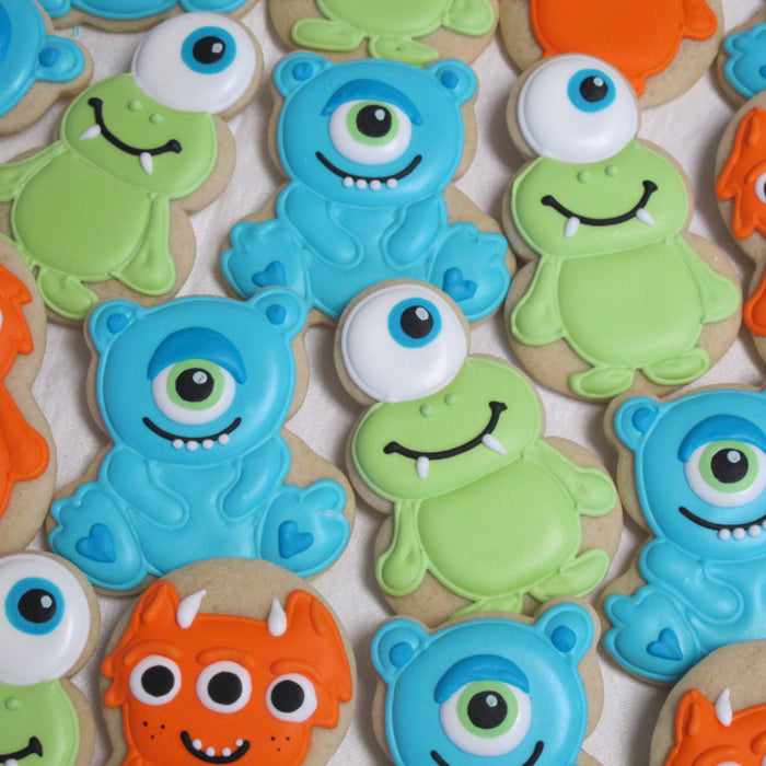Little Monster Sugar Cookies-Monster Inc Birthday Party Cookies-Alien Cookies. TheIcedSugarCookie.com Marta Ingros