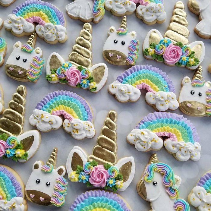 Magical Unicorn Birthday Party Iced Sugar Cookies by The Sugar Lion featured on TheIcedSugarCookie.com #cookies #sugarcookies #decoratedcookies #unicorncookies #unicornparty