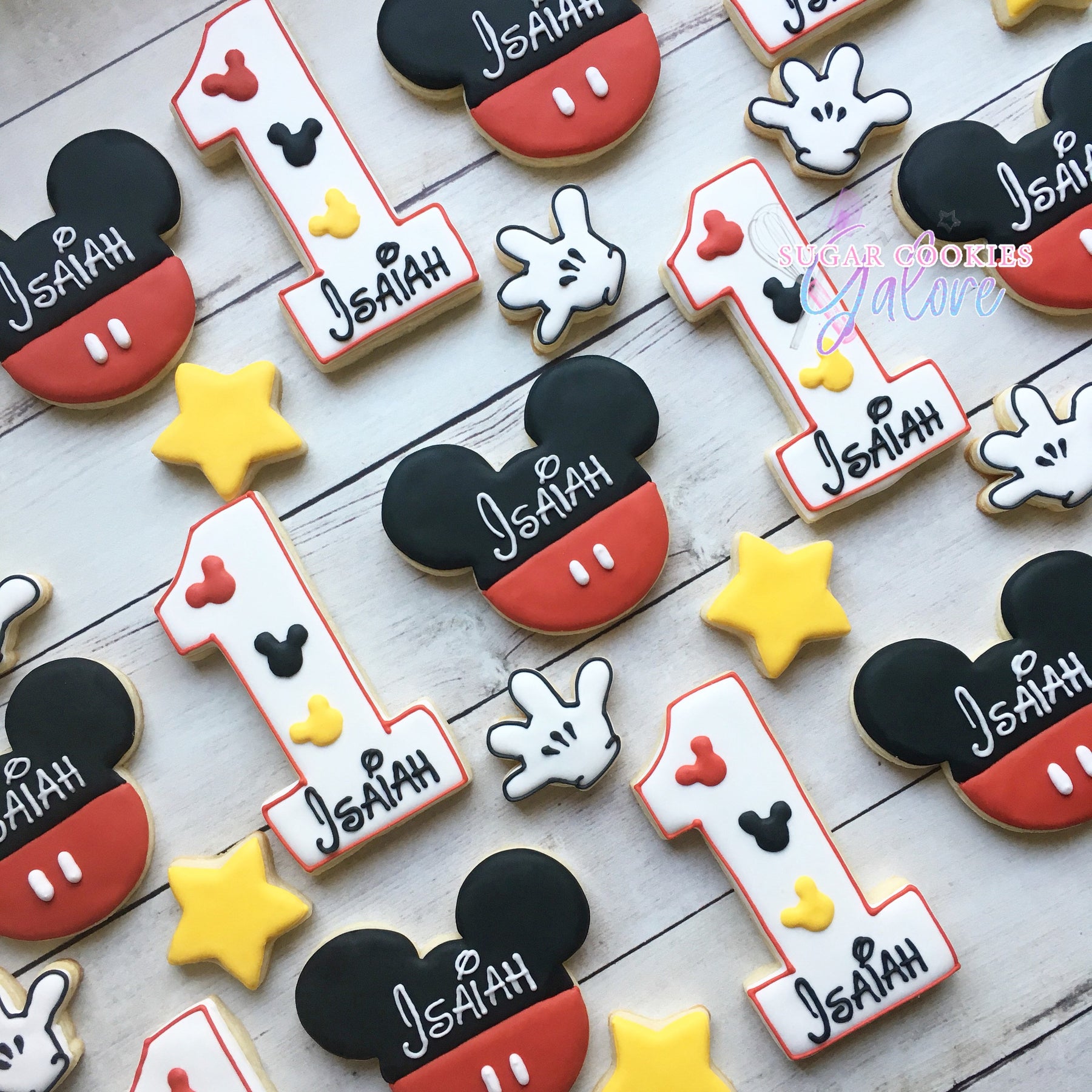 Mickey Mouse 1st Birthday Party Iced Sugar Cookies by Sugar Cookies Galore | TheIcedSugarCookie.com #cookies #sugarcookies #decoratedcookies #mickeymousecookies #mickeymouse #mickeymouseparty #1stbirthday
