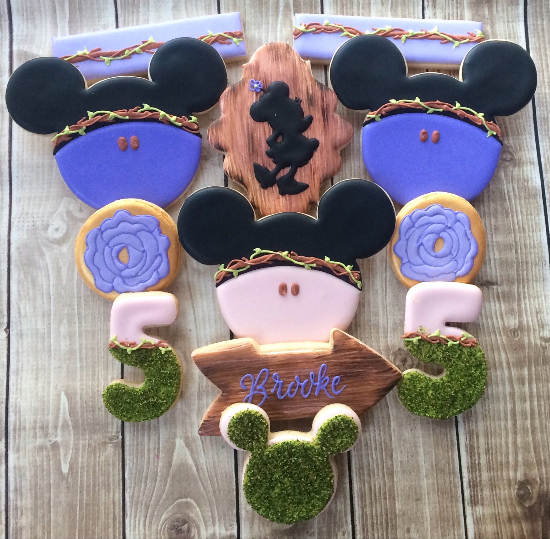 Minnie Mouse Boho Chic Woodland Birthday Party Iced Sugar Cookies by Flourish Cookies featured on TheIcedSugarCookie.com #cookies #sugarcookies #minniemouse #minniemousecookies #woodlandcookies #woodlandparty #minniemouseparty #bohochicparty