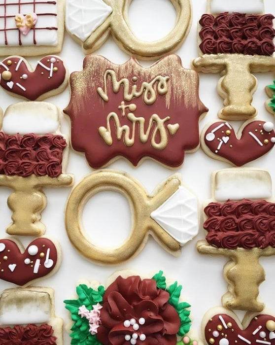 Miss To Mrs "Bride To Be" Wedding Iced Sugar Cookies by @flourfox featured on TheIcedSugarCookie.com #sugarcookies #decoratedcookies #icedsugarcookies #theicedsugarcookies #weddingcookies #bridecookies #weddingsugarcookies #bridesugarcookies