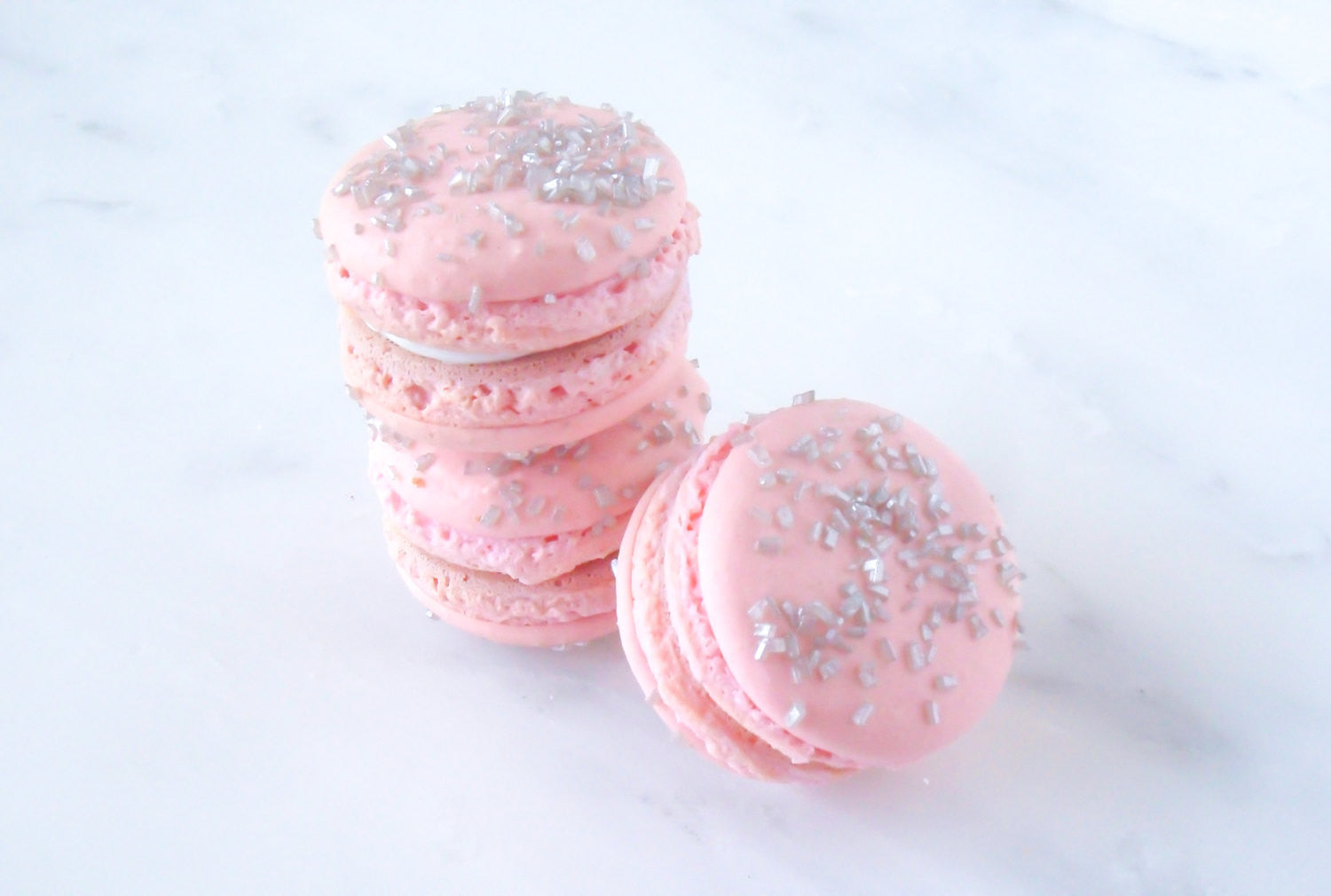 Pale Pink French Macarons Encrusted With Silver Sugar Crystals Filled With Madagascar Vanilla Ganache