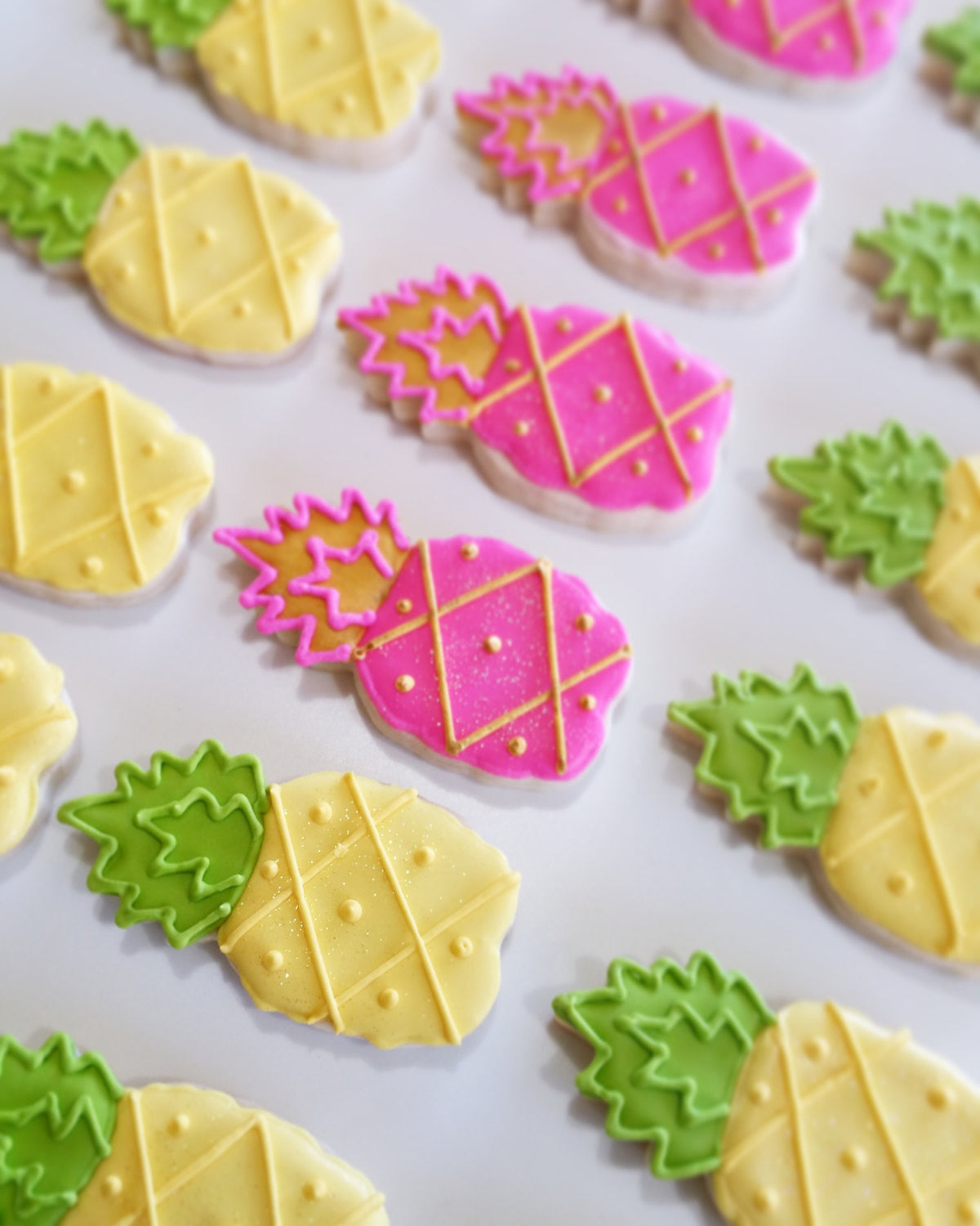 Tropical Pineapple Birthday Party Sugar Cookies TheIcedSugarCookie.com Kessa Cakes