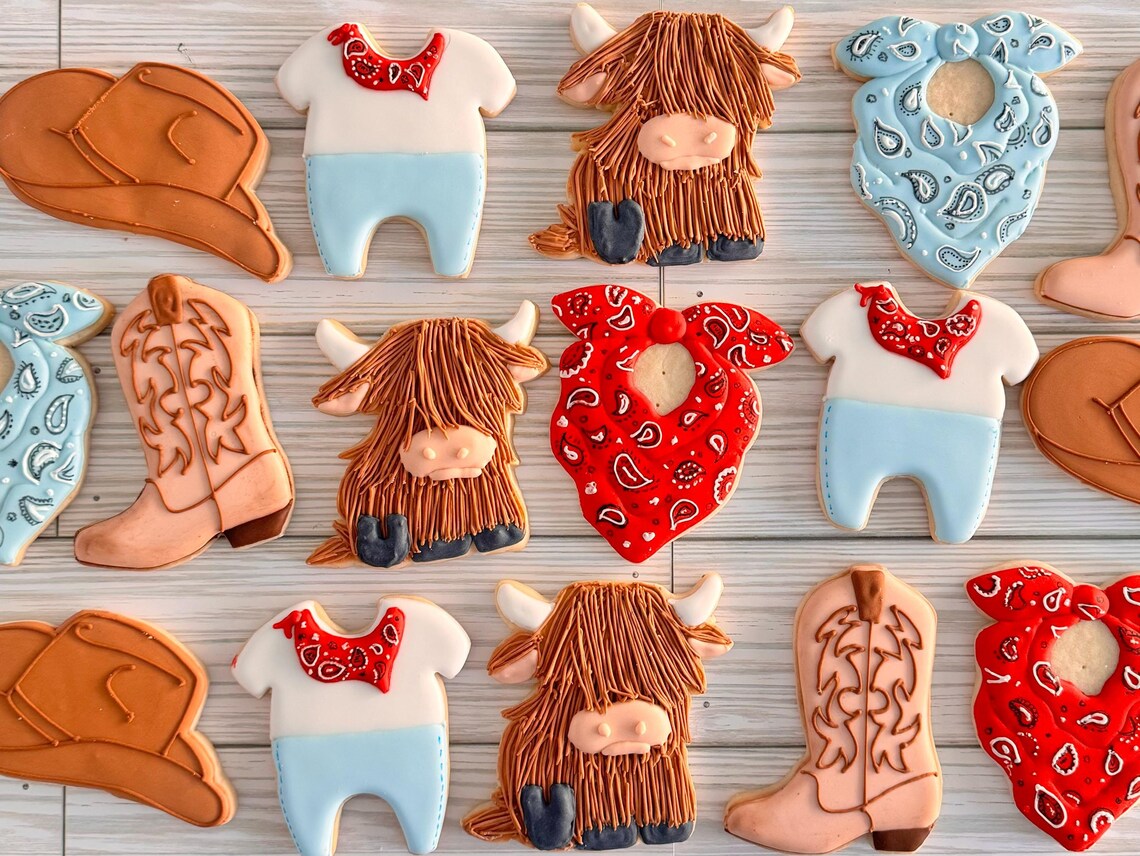 Yeehaw-Worthy Rodeo Cowboy Western Baby Shower Cookies by Sweet Spot Cookie Art featured on TheIcedSugarCookie.com