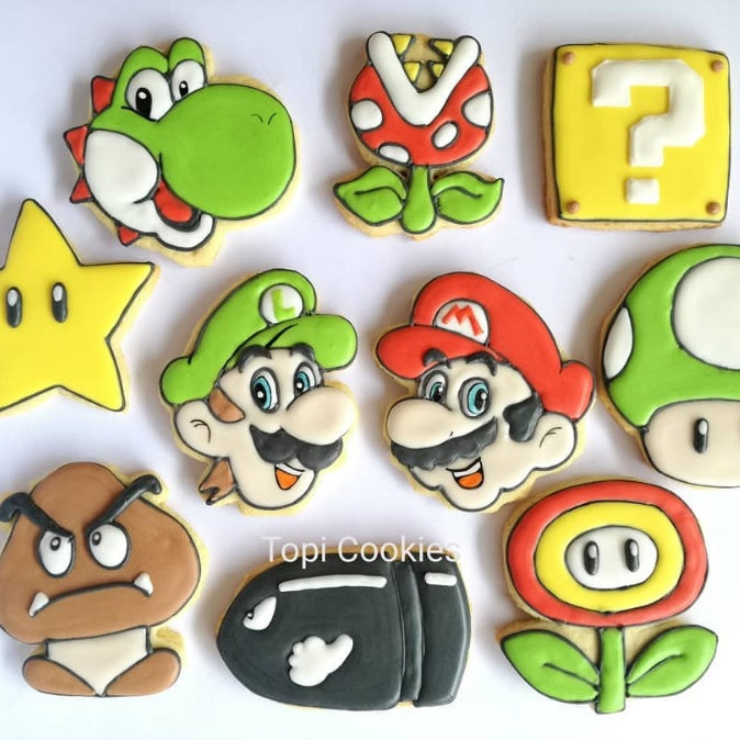 Super Mario Brothers Birthday Party Iced Sugar Cookies by @TopicCookies featured on TheIcedSugarCookie.com #sugarcookies #supermariocookies #supermarioparty #supermariobrothersparty #supermariobrotherscookies #decoratedsugarcookies #theicedsugarcookie