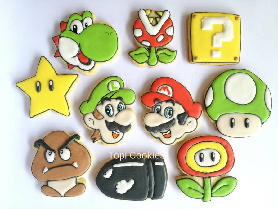 Super Mario Brothers Birthday Party Iced Sugar Cookies by @TopicCookies featured on TheIcedSugarCookie.com #sugarcookies #supermariocookies #supermarioparty #supermariobrothersparty #supermariobrotherscookies #decoratedsugarcookies #theicedsugarcookie