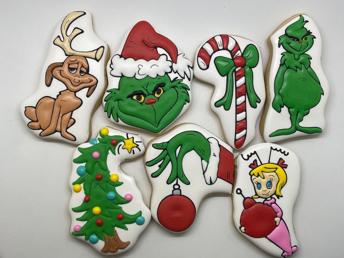 You're A Mean One Mr. Grinch Christmas Iced Sugar Cookies by Ladybug Bake Shop Featured on TheIcedSugarCookie.com