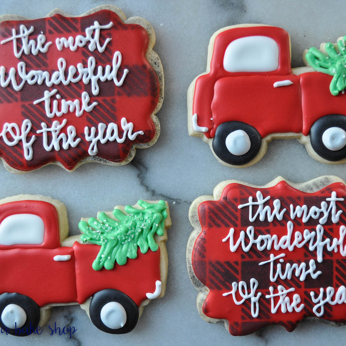 Holiday Truck Hauling Christmas Trees Decorated Iced Sugar Cookies featured on TheIcedSugarCookie.com Created by "LucyBerry A Bake Shop" #sugarcookies #christmascookies #decoratedchristmascookies #cookies #christmas #icedsugarcookies #theicedsugarcookie
