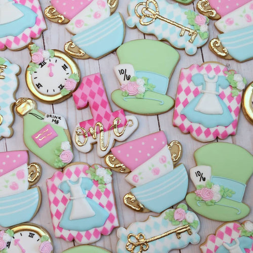 Alice In Onederland First Birthday Party Iced Sugar Cookies Alice In Wonderland Mad Hatter Custom Cookies Created by @SweetMazies #sugarcookies #cookies #baking #aliceinwonderlandcookies #theicedsugarcookie 