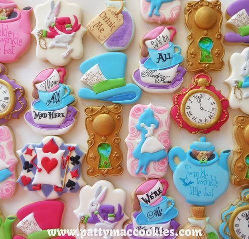Alice In ONE-derland Iced Sugar Cookies featured on TheIcedSugarCookie.com created by @pattymaccookies #cookies #aliceinwonderlandcookies #aliceinwonderland #aliceinwonderlandsugarcookies #sugarcookies #partyideas #baking