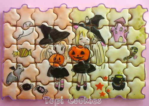 Halloween Cookie Puzzle created by @TopiCookies was featured on TheIcedSugarCookie.com #halloweencookies #halloweensugarcookies #halloween #cookies #sugarcookies #decoratedsugarcookies 