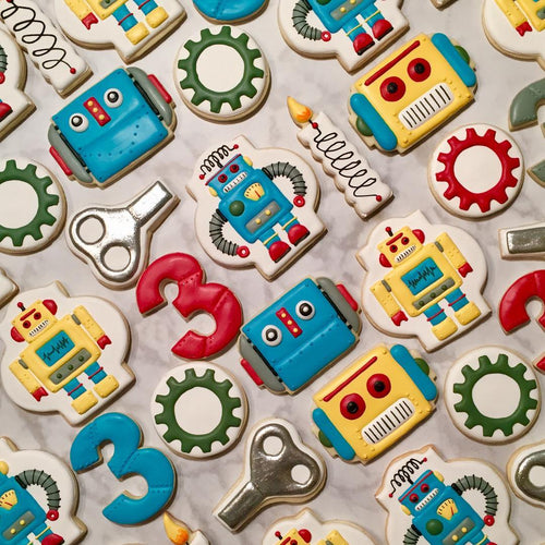 Retro Robot Birthday Party Iced Sugar Cookies by @blueberryhillcookieco featured on TheIcedSugarCookie.com #robotcookies #robotsugarcookies #robotparty #robotbirthday #theicedsugarcookie #sugarcookies #decoratedcookies