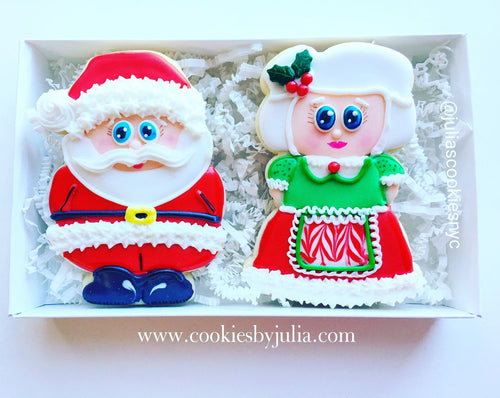 Christmas Santa Claus & Mrs. Clause Decorated Iced Sugar Cookies created by "Cookies By Julia" featured on TheIcedSugarCookie.com #santacookies #santasugarcookies #christmassugarcookies #christmascookies #icedsugarcookies #christmas #santa
